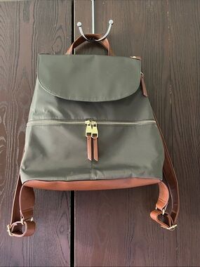 Steve Madden dark green backpack purse with change purse.
